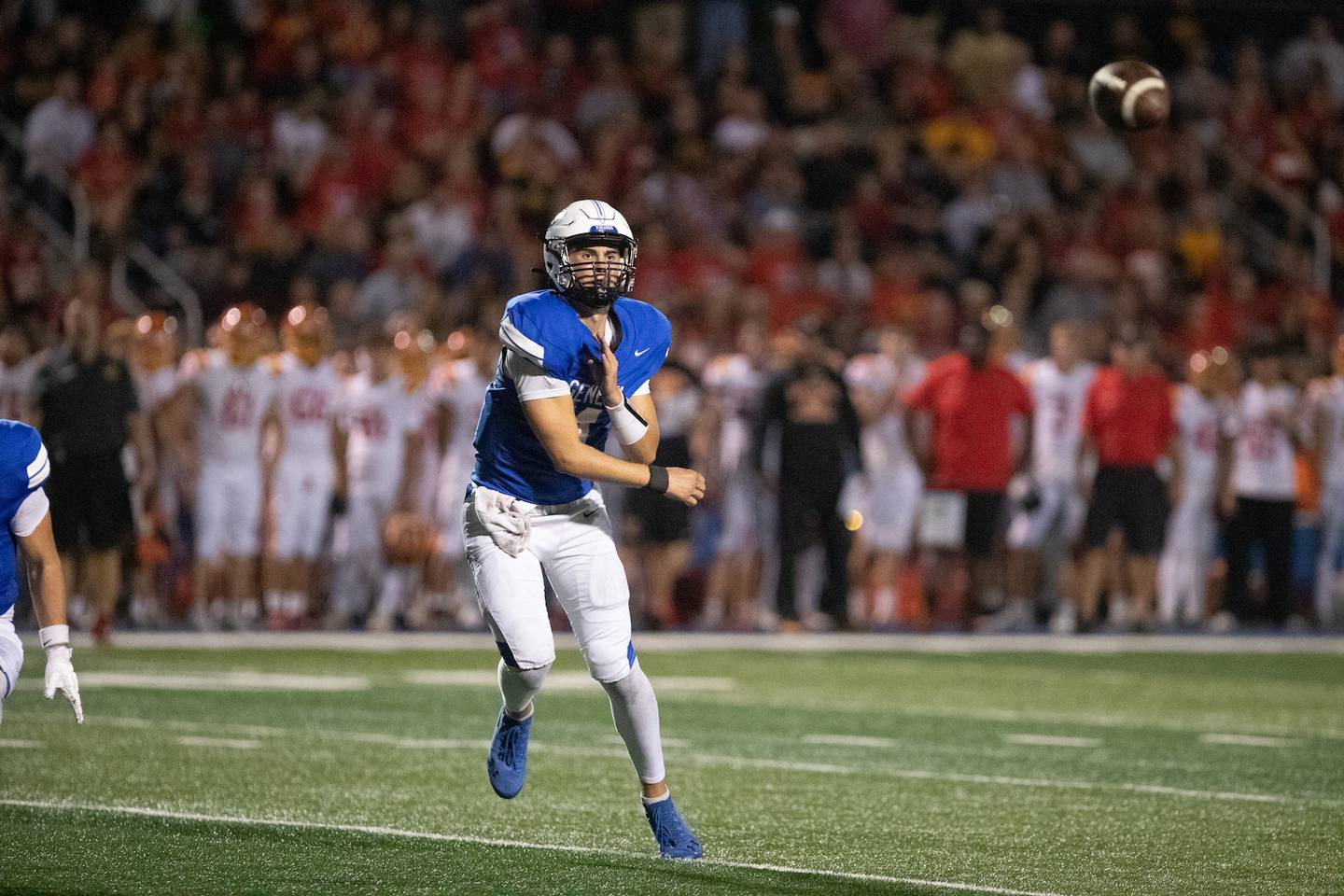 Geneva's Benjamin Peterson throws the ball for a gain against Batavia on Friday, Oct. 3, 2025 in Geneva.