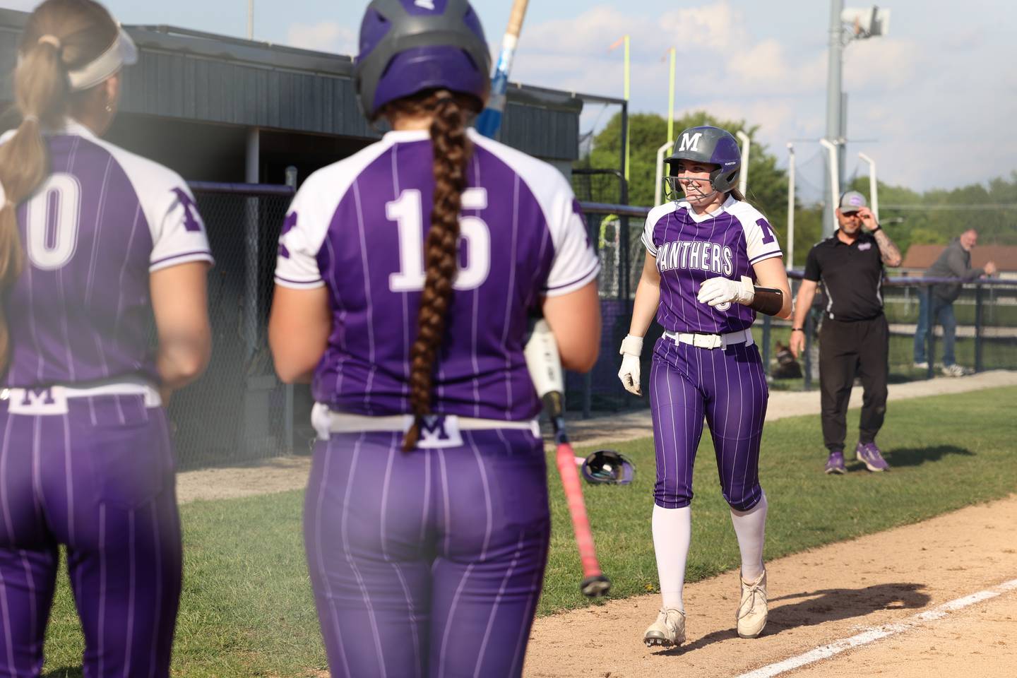 Manteno's Aubrie Goudreau smiles as she nears home plate following her home run during Manteno's 11-1 loss to Seneca on Friday, May 8, 2026.