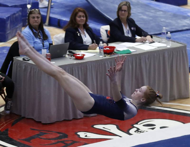 Oswego's Sam Phillips competes in the preliminary round of the floor exercise Friday, Feb. 17, 2023, during the IHSA Girls State Final Gymnastics Meet at Palatine High School.