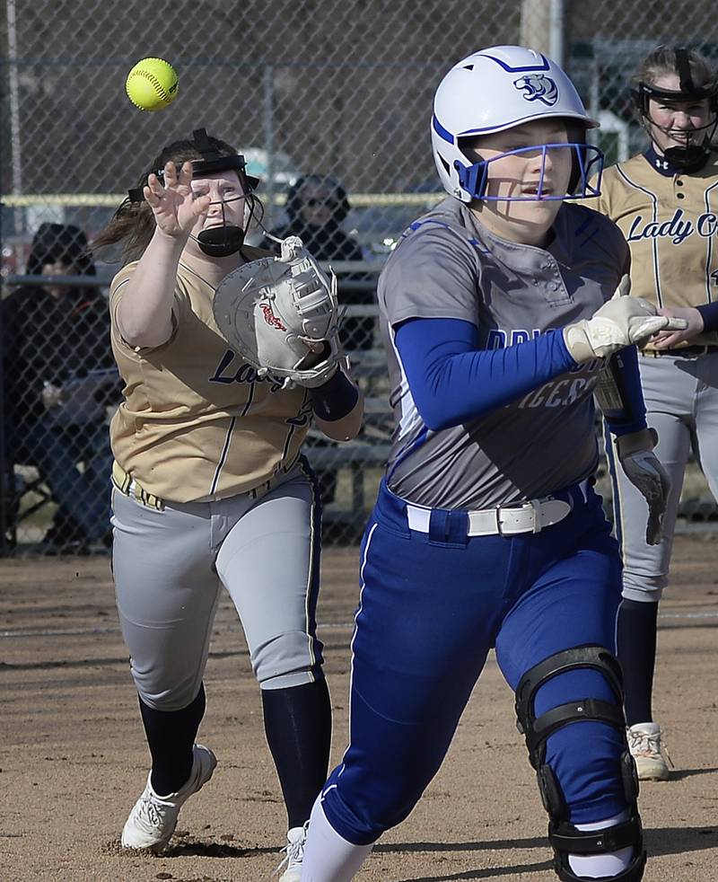 Marquette 1st baseman Talor Cuchra tosses to first as Princeton’s Isa Ibarra was out on a bunt attempt on Monday, March 27, 2023 at Marquette.
