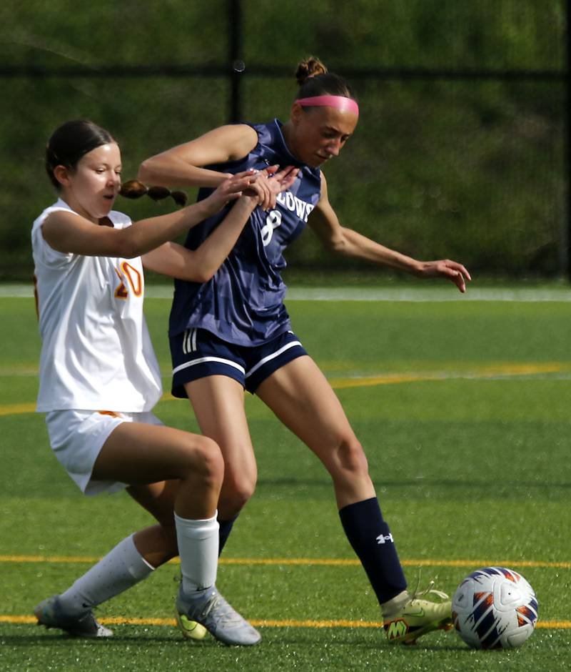 Richmond-Burton's Ella Seyller battles with Willows Academy's Kamila Mikula during an IHSA Class 1A Cristo Rey St. Martin Sectional semifinal girls soccer match on Tuesday, May 26, 2026 at Cristo Rey St. Martin College Prep, in Waukegan.