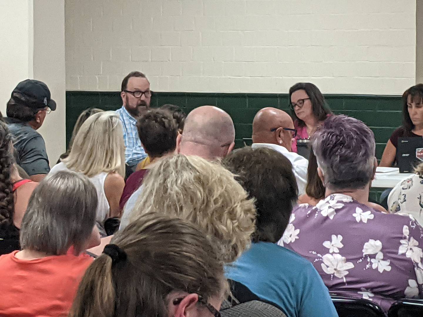 Dixon Public Library Director Antony Deter speaks to a large crowd Monday, July 11, 2022, following concerns from some residents on explicit material in an LGBTQ comic book.