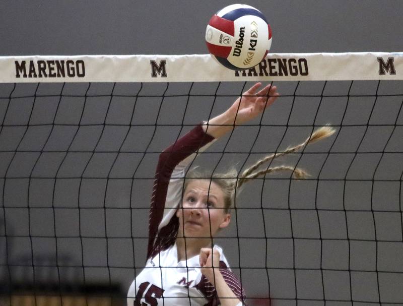 Marengo’s Dayna Carr watches her shot sail over the net against Marian Central in IHSA Class 2A Regional volleyball action on Monday, Oct. 28, 2024, at  Marengo High School  in Marengo.