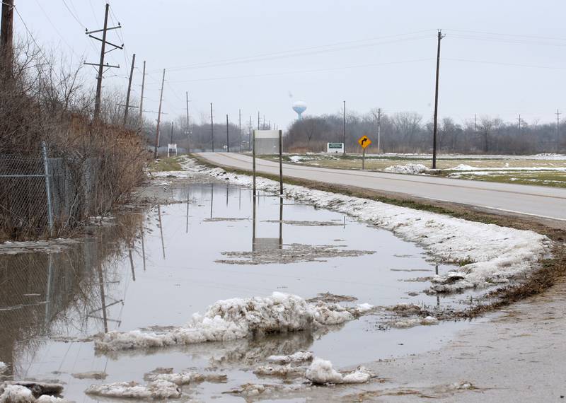 Water nears the roadway of Dee Bennett Road on Friday, Jan. 26, 2024 near the La Salle County Nursing Home. La Salle County Highway Department has closed Dee Bennett Road from the intersection of North 2803rd Road and Dee Bennett west to Utica.
