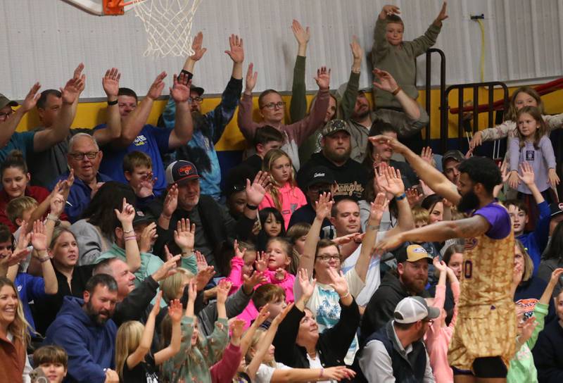 Harlem Wizards player Deven Dorsett (Just Do It) fires up the crowd during the Harlem Wizards event on Tuesday, Oct. 28, 2025 in Pannebaker Gymnasium at Logan Jr. High School in Princeton.