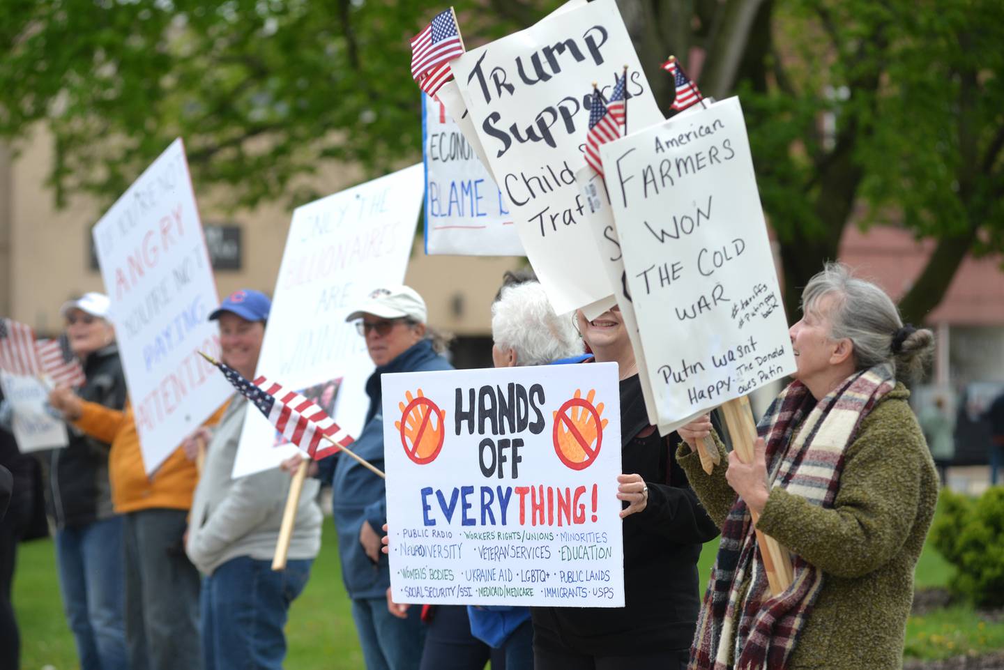 Attendees displayed a variety of signs at the May Day Rally on Thursday, May 1, 2025 in Oregon.