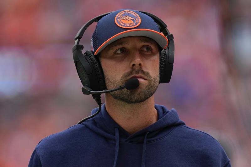 Denver Broncos tight ends coach Declan Doyle looks on against the Las Vegas Raiders during an NFL football game Sunday, Sept. 10, 2023, in Denver. (AP Photo/Jack Dempsey)