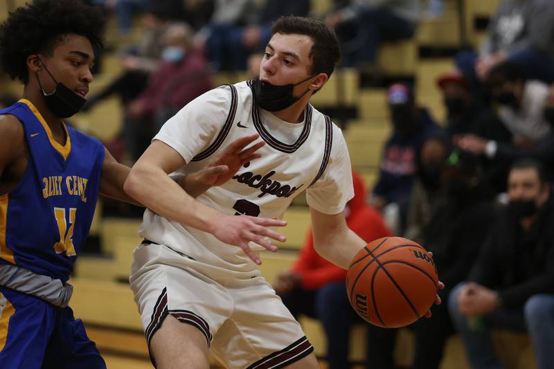 Lockport’s Alexander Vassilakis looks to make a play against Joliet Central. Monday, Jan. 31, 2022 in Lockport.
