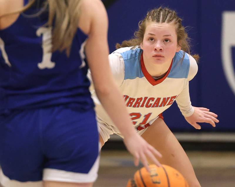 Marian Central's Lainey Remke plays defense against Hinckley-Big Rock's Payton Murphy Monday, Feb. 16, 2026, during their regional semifinal game at Hinckley-Big Rock High School.