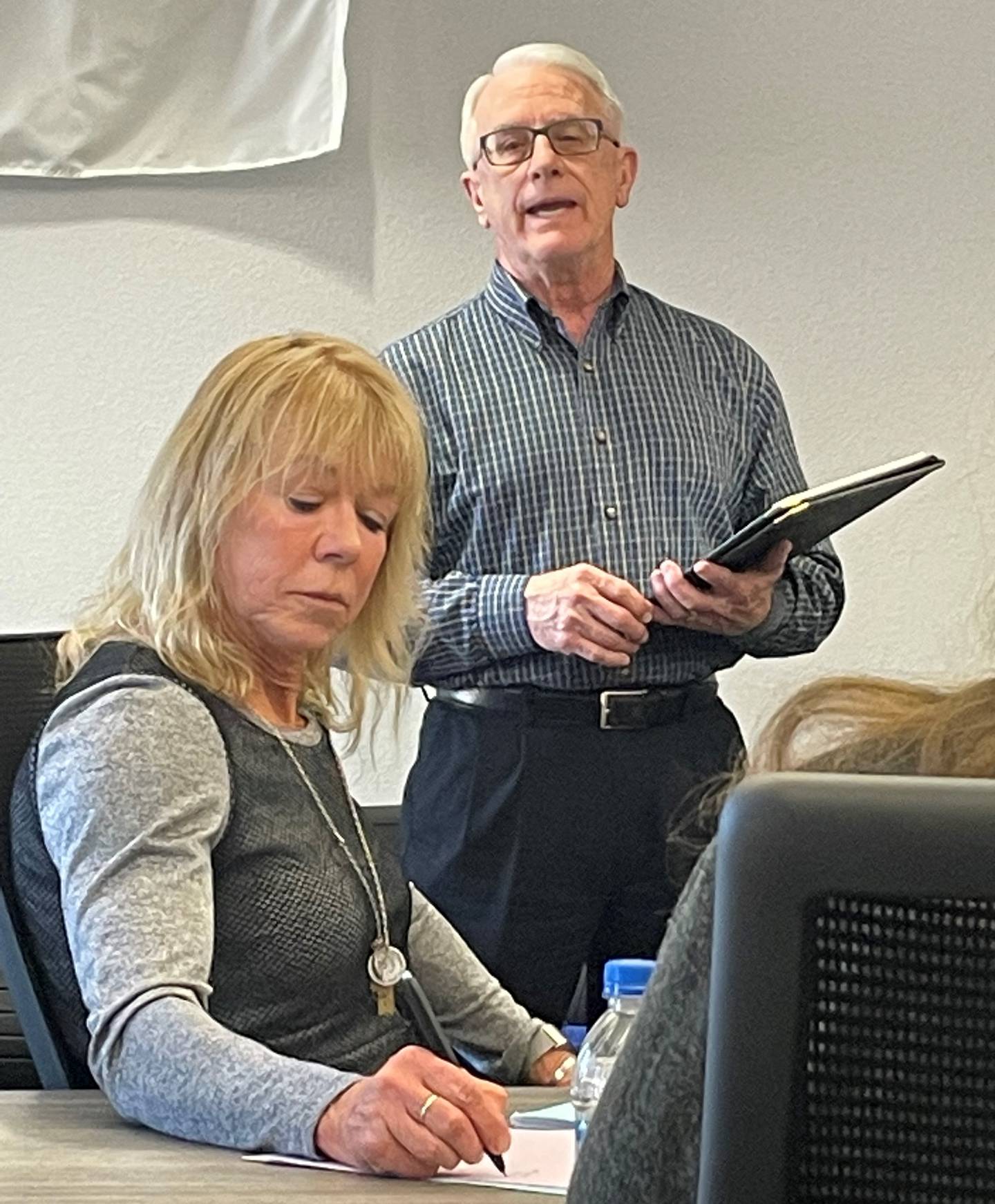 Former IVCC President and trustee Larry Huffman, of Peru, spoke to the board about the pandemic’s impact on enrollment and lauded President Jerry Corcoran for seeing the college through difficult times. New trustee Rebecca Donna is pictured in the foreground.