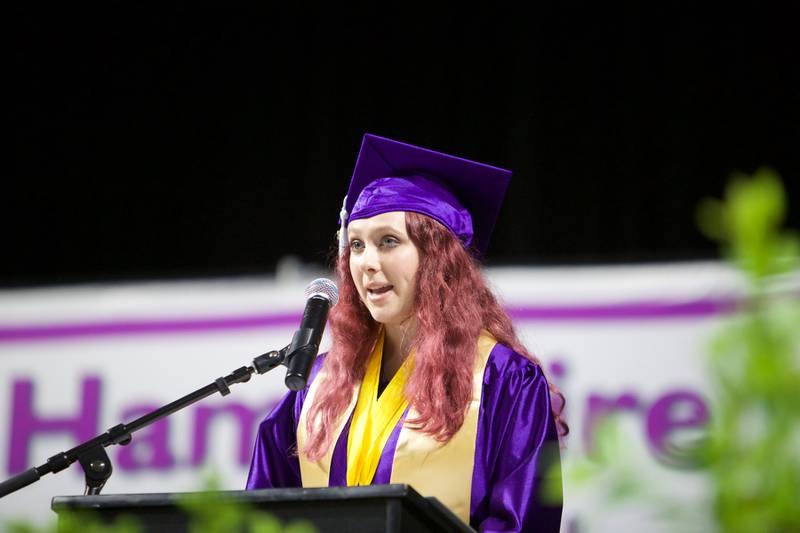 Salutatorian Natalia Gerischer talks to the graduating class at the Hampshire High School graduation ceremony on May 21, 2022, at the NOW Arena in Hoffman Estates.