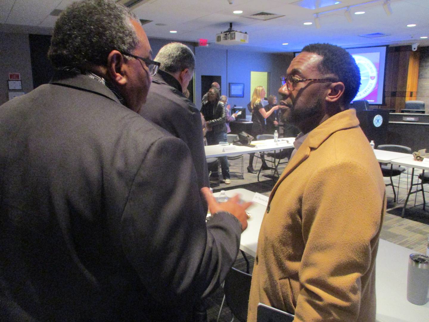 The Rev. Wendell Martin (right) was elected vice chairman of the Joliet Comprehensive Plan Advisory Committee on Wednesday. He is seen speaking after the committee meeting on Wednesday speaking with the Rev. Warren Dorris, a fellow member of the committee. March 5, 2025