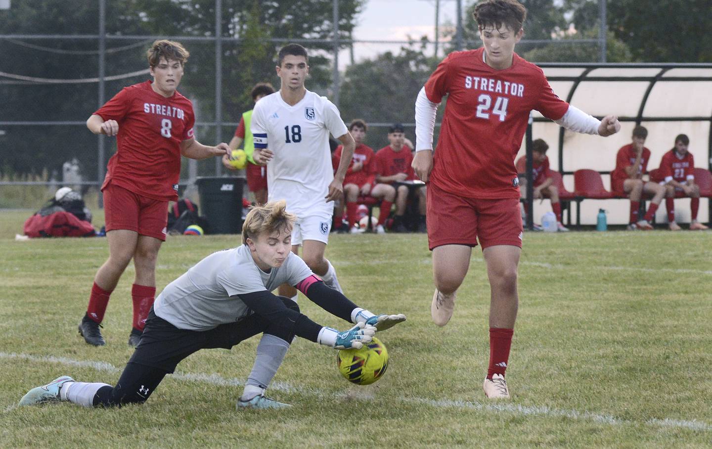 Streator keeper Seth Zito makes a stop against Plainfield South on Tuesday, Sept. 9, 2025, while looking on are (from left to right) Streator's Blake Fialko, Plainfield South's Benjamin Ramirez (18) and Streator's Keegan Gassman (24).
