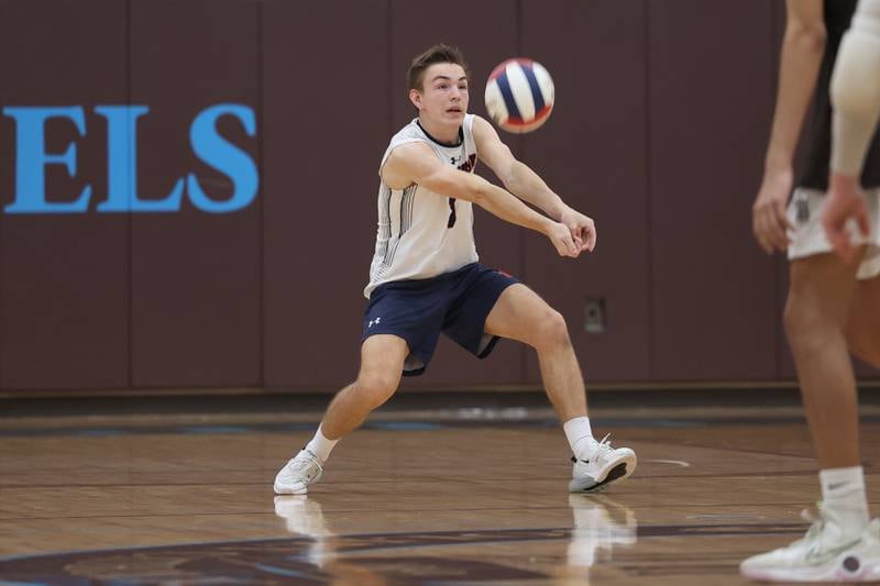 St. Viator’s Tommy Westerkamp receives the serve against Joliet Catholic on Wednesday, April 24, 2024 in Joliet.