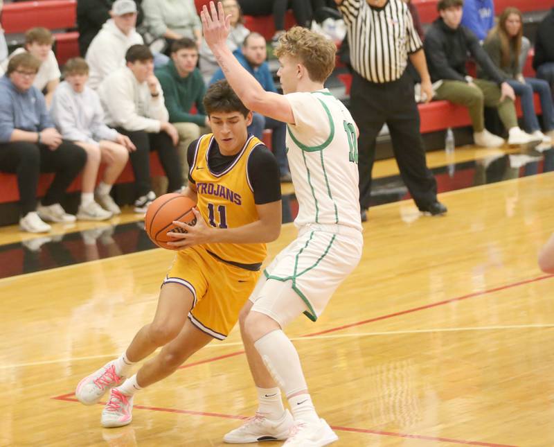 Mendota's Iziah Nenez works his way inside Rock Falls's Kuitim Heald during the 49th annual Colmone Classic on Friday, Dec. 8, 2023 at Hall High School.