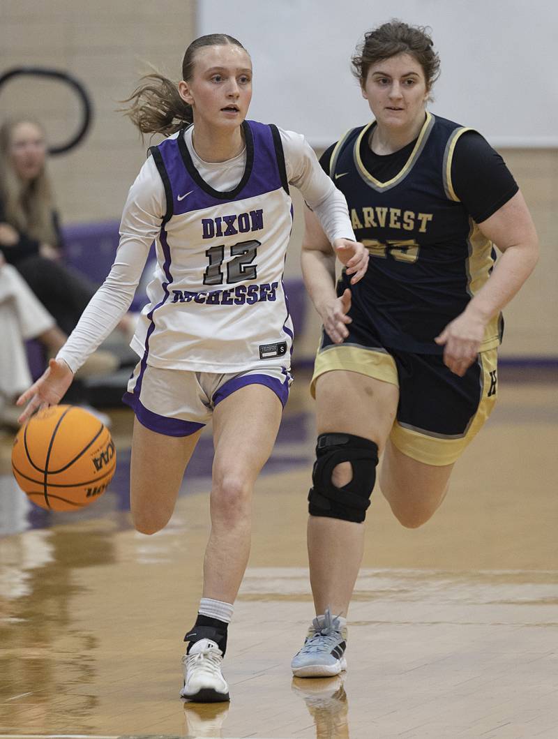 Dixon’s Grace Ackert brings the ball up court against Harvest-Westminster Wednesday, Feb. 11, 2026.