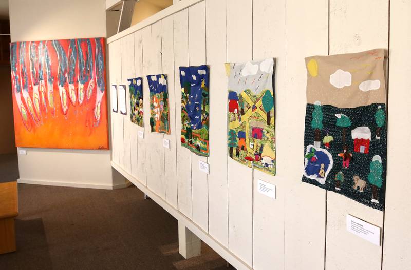 Some of the work in the Arts in Action exhibition Wednesday, Sept. 18, 2024, at the Ellwood House Museum in DeKalb. The exhibit features work by local Latino artists and runs through the end of the year.