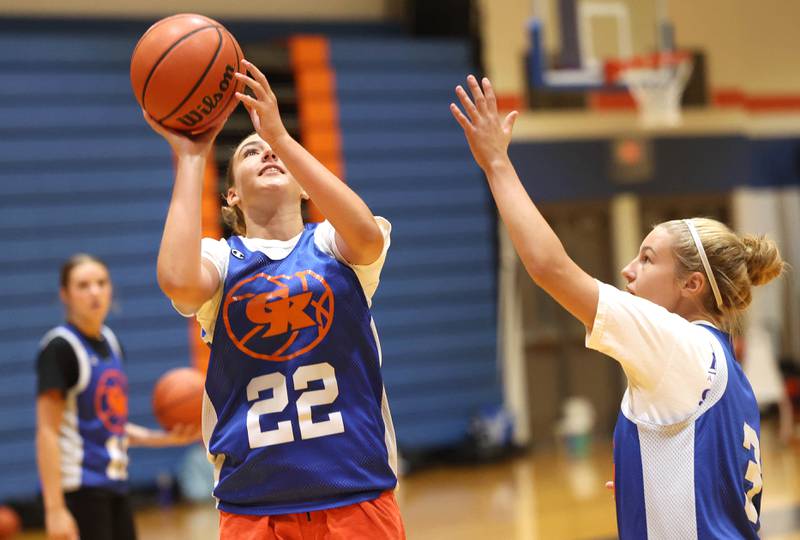 Genoa-Kingston’s Regan Creadon gets a shot off during a drill Wednesday, June 26, 2024, at summer practice at the school.