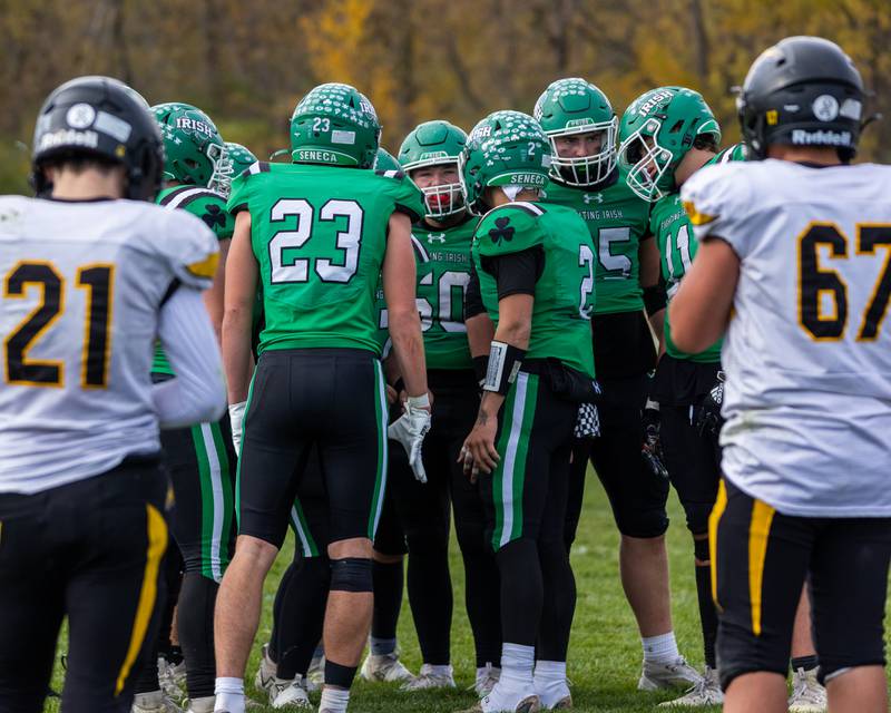Seneca players huddle before play on Saturday, November 1, 2025 at Seneca High School in Seneca.