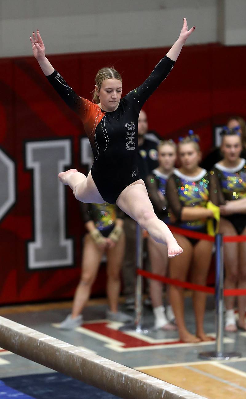 DeKalb’s Jenna Feeny competes in the preliminary round of the balance beam on Friday, Feb. 20, 2026, during the IHSA Girls State Final Gymnastics Meet at Palatine High School. DeKalbs