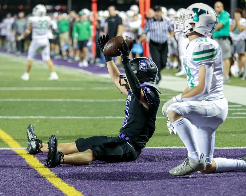Downers Grove North's Owen Thulin (5) prematurely celebrates a touchdown that was ruled down at the one yard line during football game between York at Downers Grove North.  Sept 29, 2023.