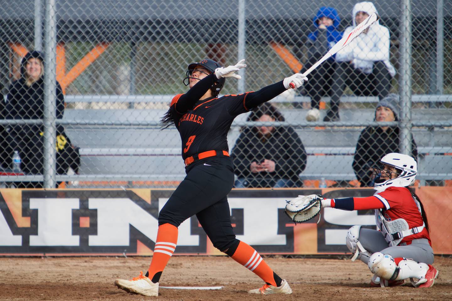 St. Charles East's Cici Wilson connects for a home run against West Aurora on April 6,2022 in St. Charles.