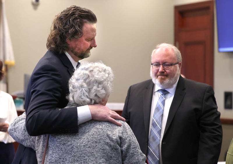 A family member of murdered Sycamore mother and son Patricia and Robert Wilson thank lead prosecutor Scott Schwertley and his team Thursday, March 20, 2025, after the sentencing of Jonathan D. Hurst who was convicted of the 2016 killings. Hurst was sentenced to life in prison.