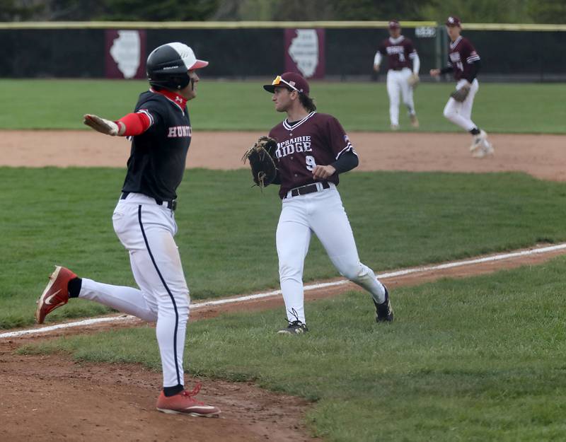 Huntley's Kyle Ziebell celebrates scoring the first run of the bgame during a Fox Valley Conference baseball game against Prairie Ridge on Friday, May 1, 2026, at Prairie Ridge High School.