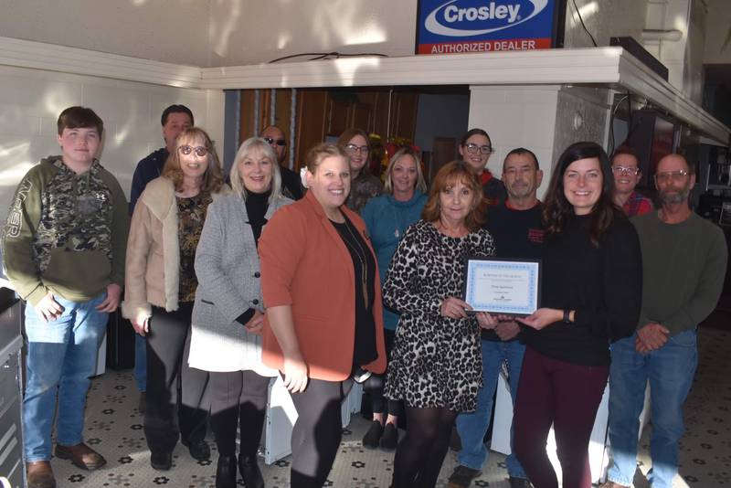 Shaw Appliance was named Streator Chamber's October 2022 business of the month. Celebrating the achievement are (left to right) Ryan Stipp, Joe Adamchak, Paul Losey, Anna Losey, Judy Booze (chamber ambassador), Karen Karpati (chamber board), Megan Wright (chamber member services coordinator), Ali Chismarick, Kathy Losey (Shaw owner), Abby Losey, Pat Clift, Courtney Levy (chamber executive director), Sherry Clift and Bill Cunningham.