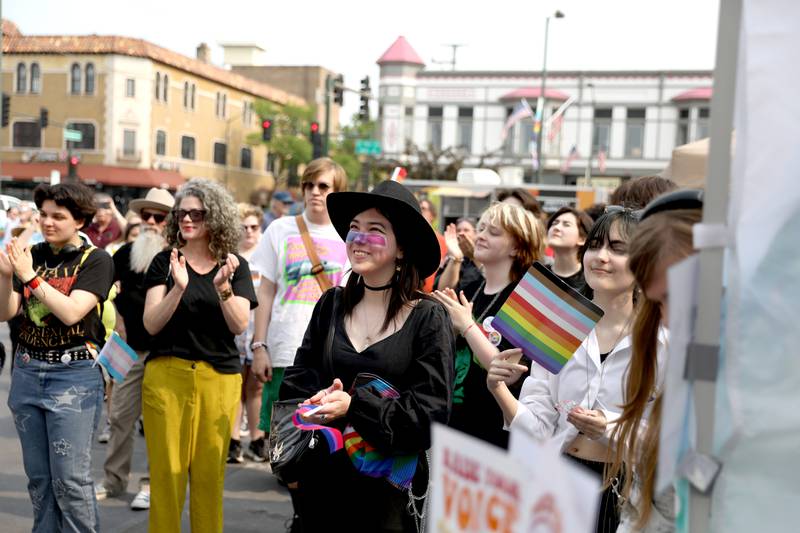 Community members watch as a pride flag is raised over St. Charles City Hall during an Inclusion Celebration on Monday, June 2, 2025 in St. Charles. This is the fourth year of the event, which is intended to connect, support, and celebrate members of the community, their families, friends and allies.