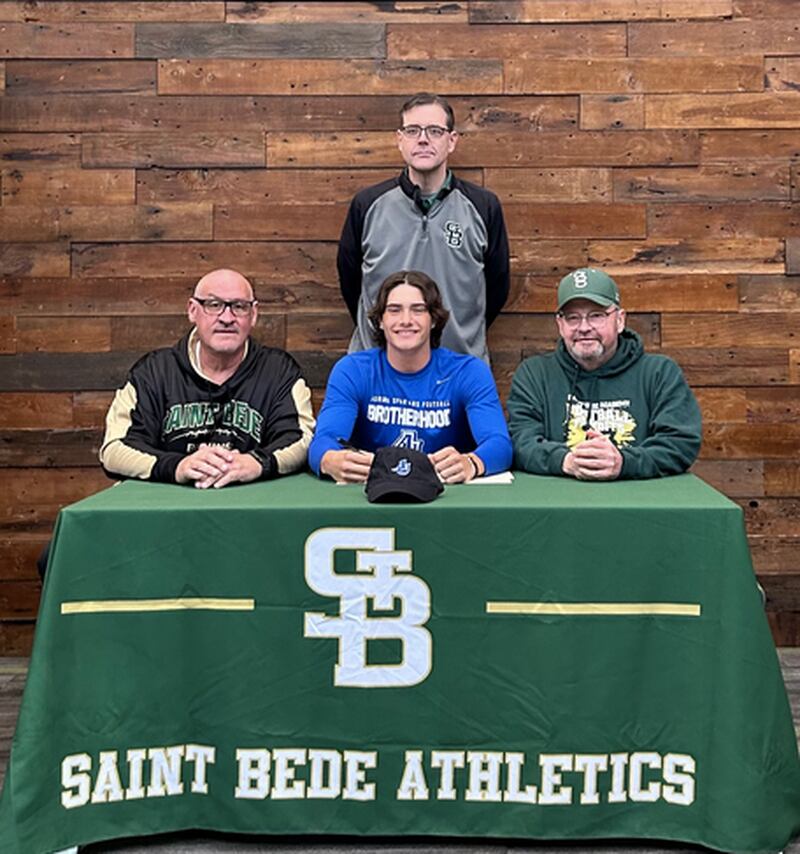 St. Bede senior Max Bray has signed to play for Aurora University. He was joined at his signing by friends, family and coaches, including Bruins head coach Jim Eustice (front left) and assistant Don Baldin and (back) St. Bede athletic director Michael Armatto.