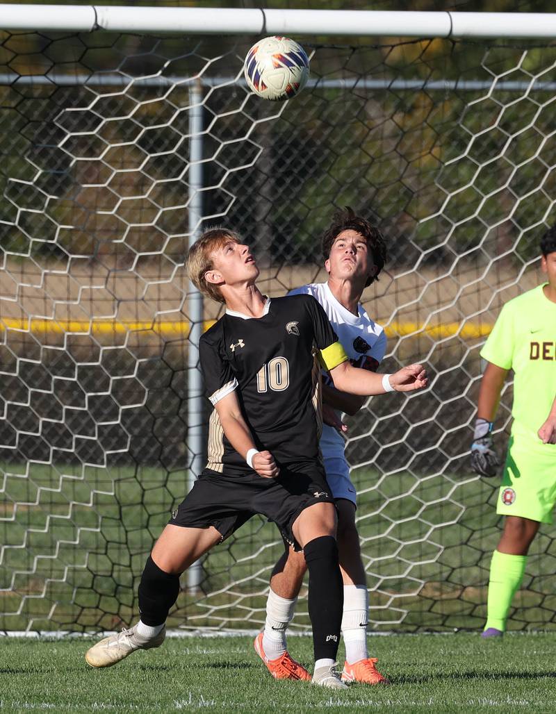Sycamore's Gavin Crouch and DeKalb's Zachariah Murray look to head the ball during the El Classicorn rivalry game Tuesday, Oct. 7, 2025, at Sycamore High School.