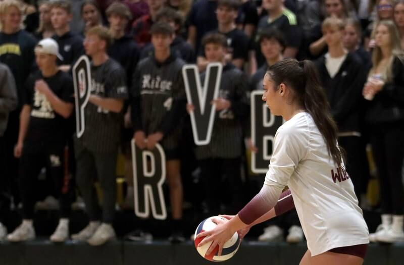 Prairie Ridge’s Maizy Agnello prepares to serve against Woodstock North in IHSA Class 3A Sectional semifinal volleyball action on Tuesday, Nov. 5, 2024, at  Crystal Lake South High School  in Crystal Lake.