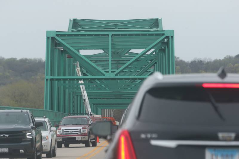 Traffic snarles as motorists cross the Illinois Route 251 bridge on Tuesday, April 16, 2024 in Peru. The bridge will be down to one-lane during the day ao Illinois Department of Transportation crews perform cleaning work.