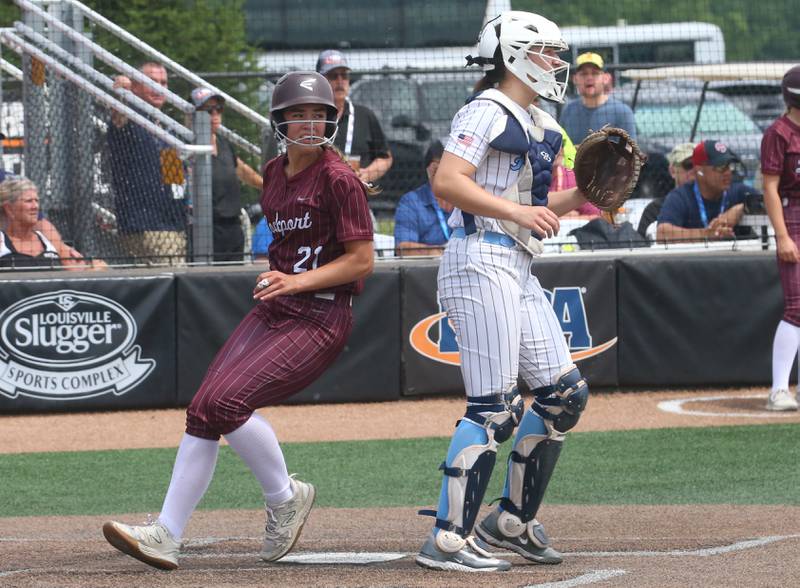 Lockport's Alexis VandurTuuk scores a run as Oak Park River Forest catcher Liliana Janeczko waits for the late throw to the plate during the Class 4A third-place game on Saturday, June 14, 2025 at the Louisville Slugger Sports Complex in Peoria.