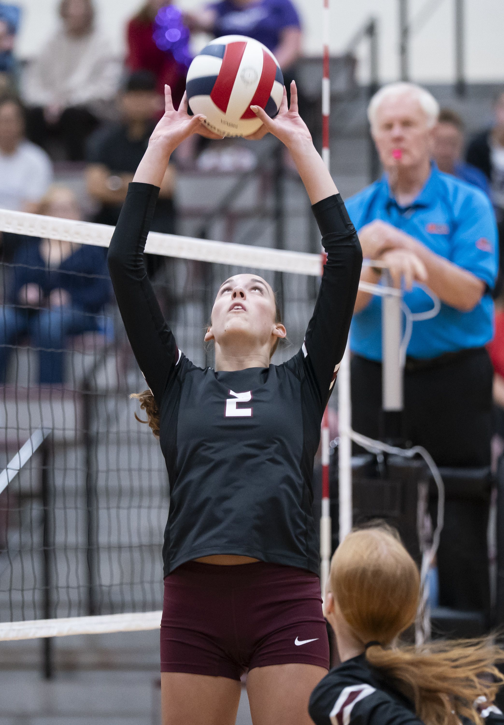 Prairie Ridge's Addi Smith sets the ball against Hampshire earlier this season at Prairie Ridge High School in Crystal Lake.