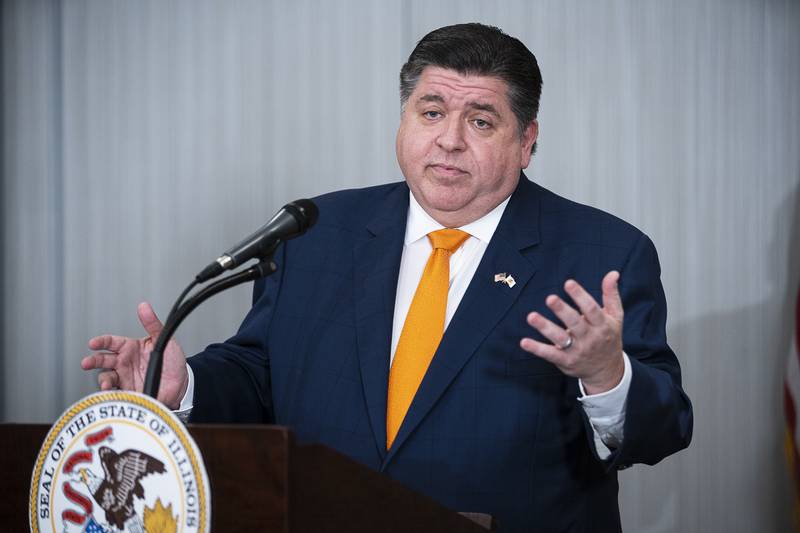 FILE - Illinois Gov. J.B. Pritzker answers questions from the media during a press conference at the Marriott Marquis Hotel in Chicago, Nov. 9, 2022. Pritzker on Friday, Feb. 24, 2023, plans to outline an expansive attack on what experts say is a mental health crisis among children, coordinating six separate state agencies in streamlining and easing access to necessary treatment. (Anthony Vazquez/Chicago Sun-Times via AP, File)