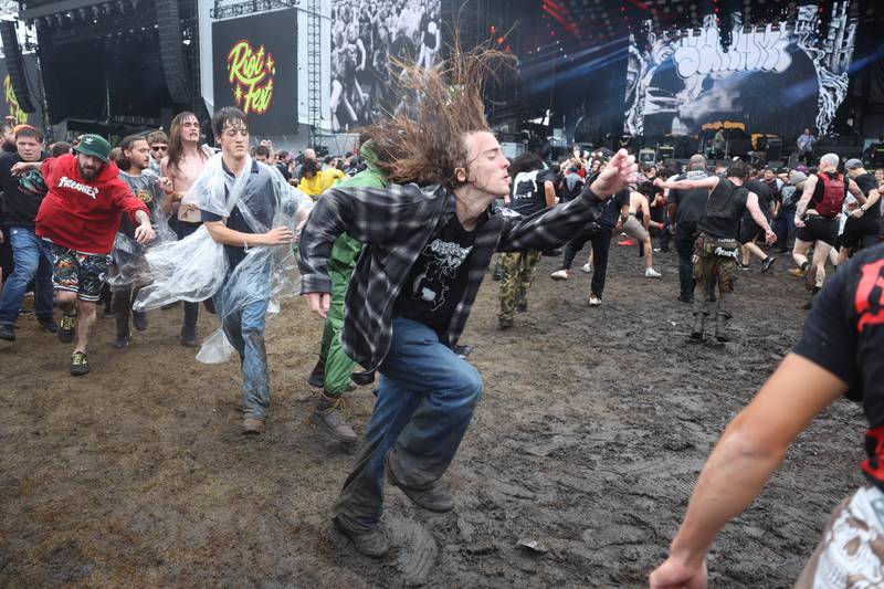 Fans dance in a mosh pit during SunamiÕs performance at Riot Fest on Sunday, Sept. 22, 2024 in Chicago.