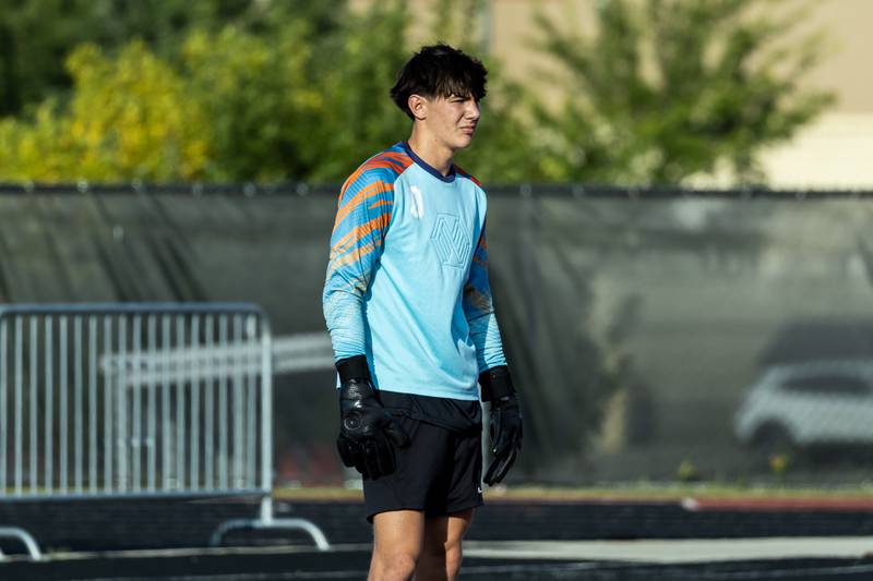 Minooka's Nolan Skedel keeps an eye on the action during a varsity soccer away game against Bolingbrook on Sept. 16, 2025.