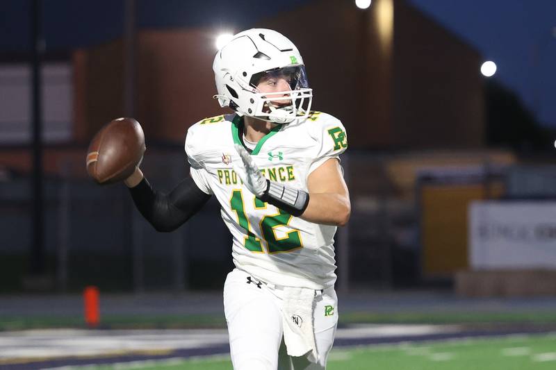 Providence’s Colin Sheehan looks to pass against Joliet Catholic on Friday, Sept. 1, 2023 Joliet Memorial Stadium.