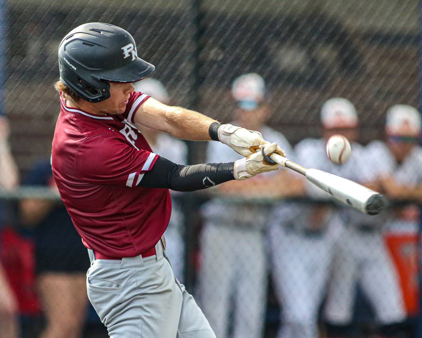 Plainfield North's John St. Clair (2) fouls off a pitch during Class 4A Romeoville Sectional semifinal game between Plainfield North at Oswego.  June 1, 2023.