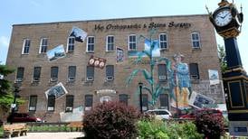 Photos: Downtown mural “Its Merits Recommend It...” by artist Olivia Gude
