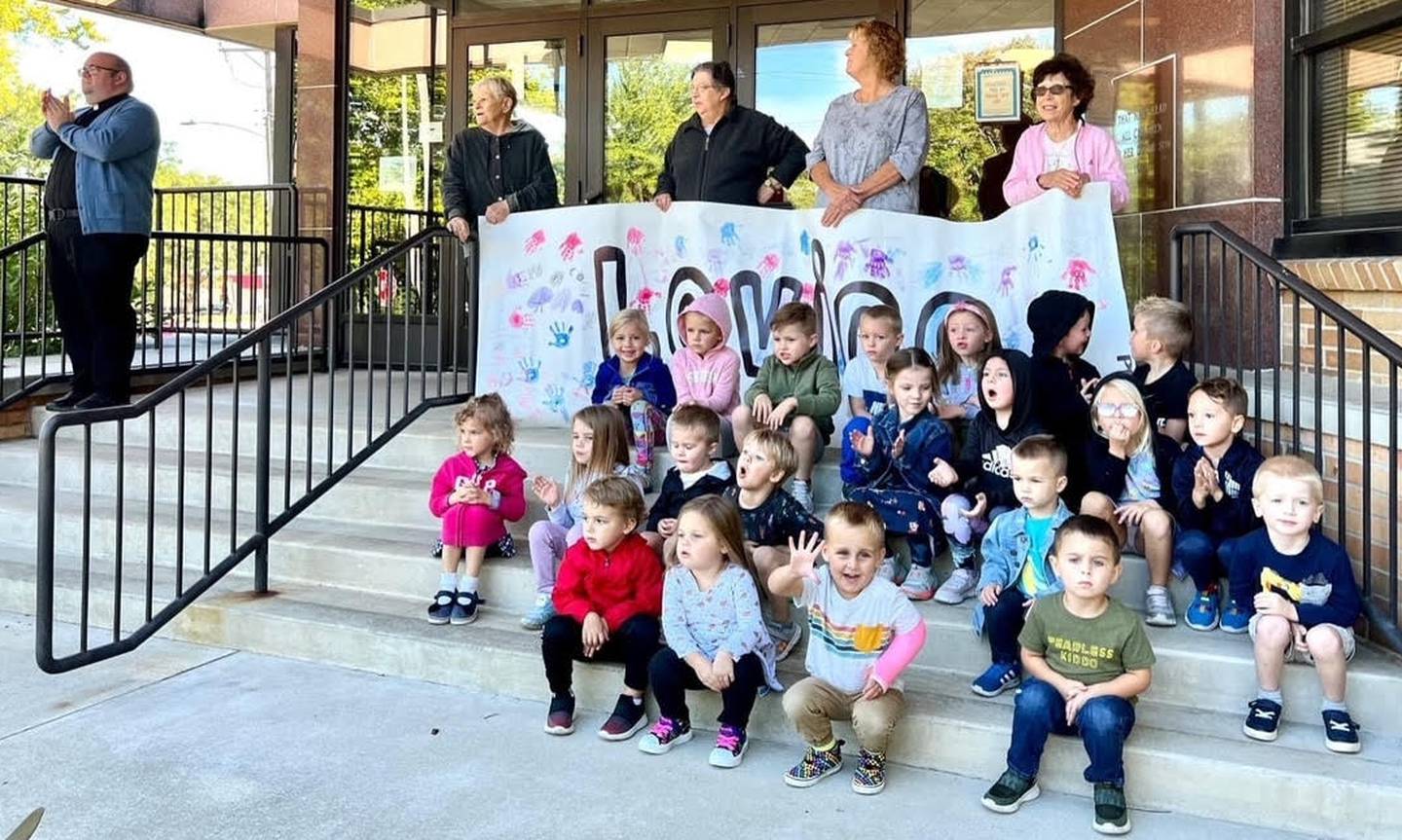 St. Mary Elementary and Junior High School students and teachers at their annual Walk, Pray, Love-A-Thon Thursday, Sept. 22. Students were outside the school expressing their faith and positive affirmations to the Dixon community.