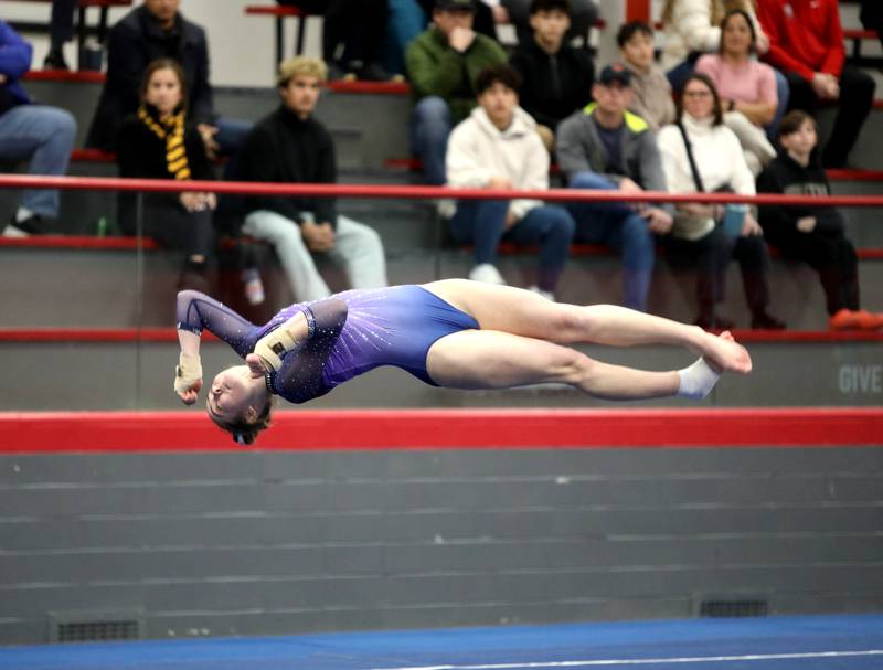 Downers Grove Co-op’s Edith Condon competes on the floor exercise during the Hinsdale Central Sectional on Monday, Feb. 10, 2025 in Hinsdale.