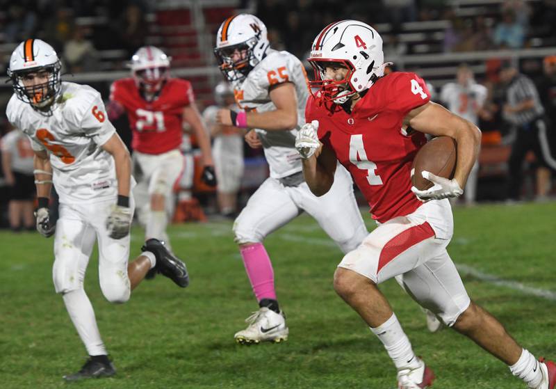 Oregon's Jakobi Donagen (4) runs with the ball against Winnebago on Friday, Oct. 17, 2025 at Landers-Loomis Field in Oregon.