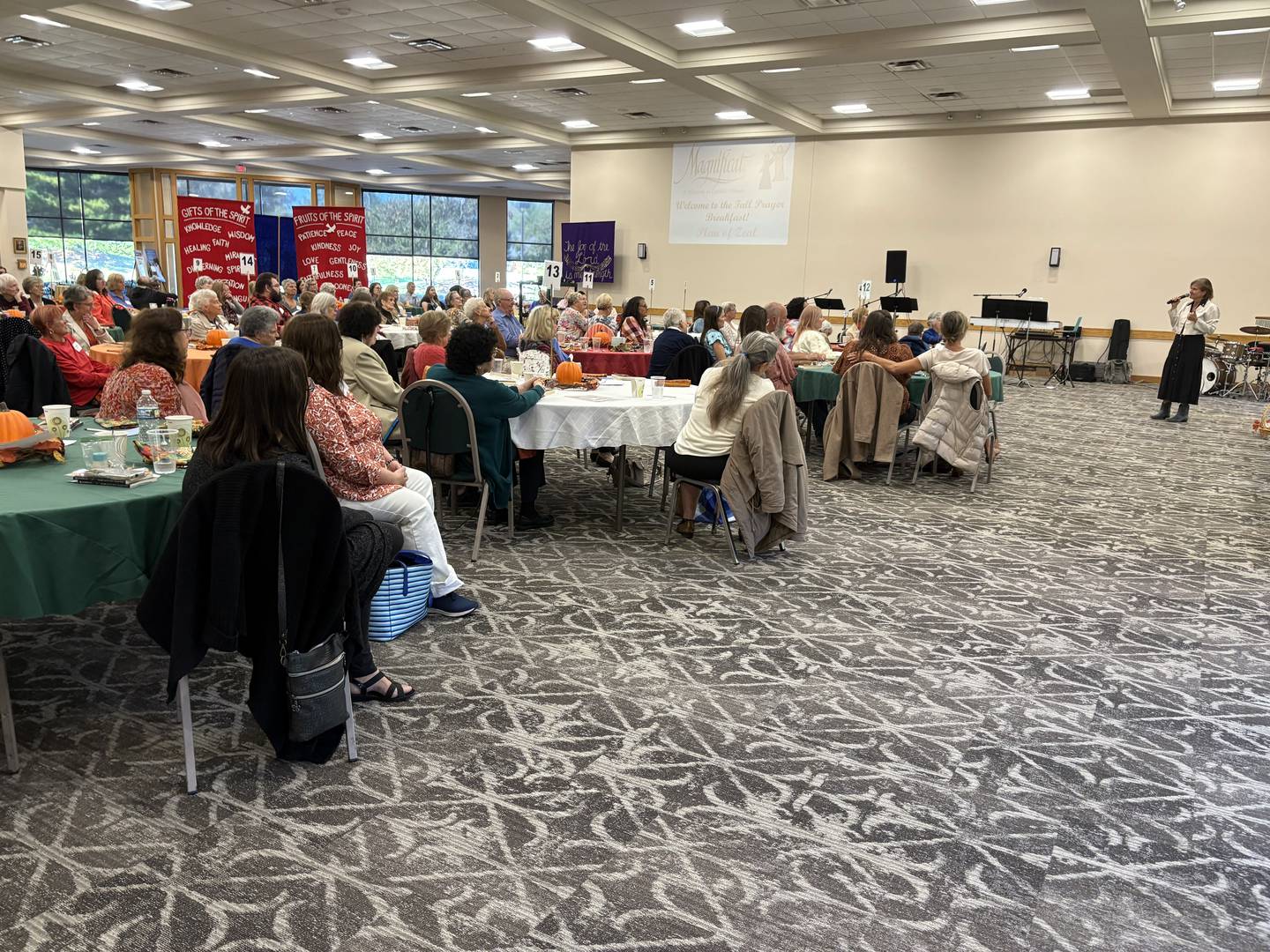 The audience listens to Cindy Govekar speak at the Magnificat prayer breakfast in Crystal Lake Oct. 11, 2025.