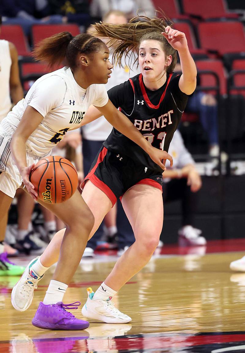 O'Fallon's Gracie Favela (25) moves past Benet Academy's Magdalena Sularski (33) during the IHSA Class 4A girls basketball championship game at the CEFCU Arena on the campus of Illinois State University Saturday March 4, 2023 in Normal.