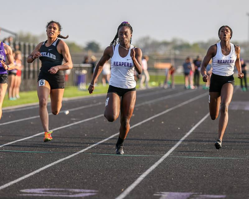 Plano's Armoney Clay wins the100m during the Interstate Eight conference meet at Plano High School.  May 9.2022.