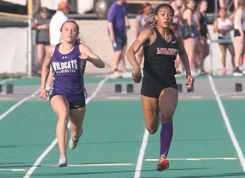 Wilmington's McKenna Van Tilburg and Monence's Jaliyah Wright compete in the 100 meter dash during the Class 1A Sectional track meet on Thursday, May 15, 2025 at Seneca High School.
