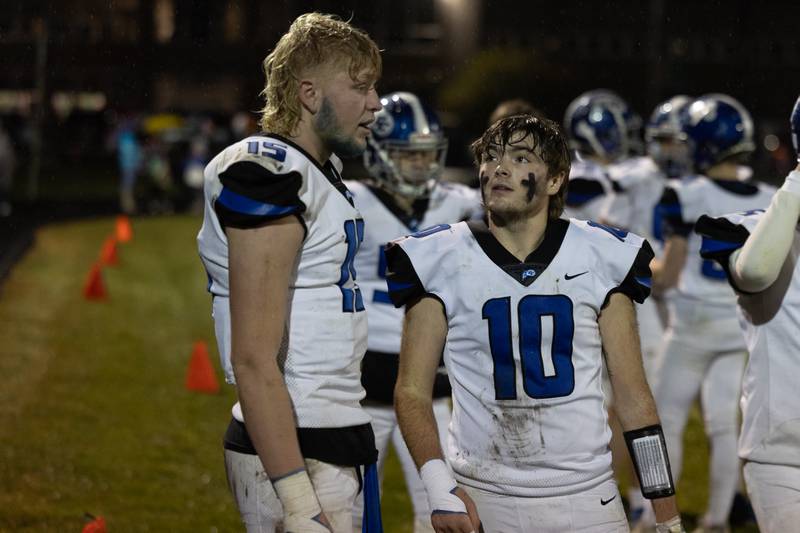 Clifton Central's Brady Shule, left, and Blake Chandler convene on the sidelines during Dwight's 43-14 victory over Clifton Central in second round playoffs on Saturday, Nov. 8, 2025.